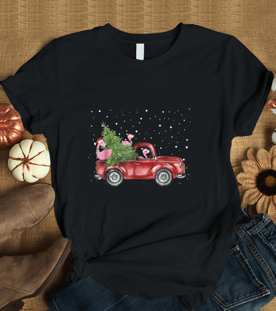 Festive Flamingos Drive Red Truck with Christmas Tree in Snowy Scene T-Shirt