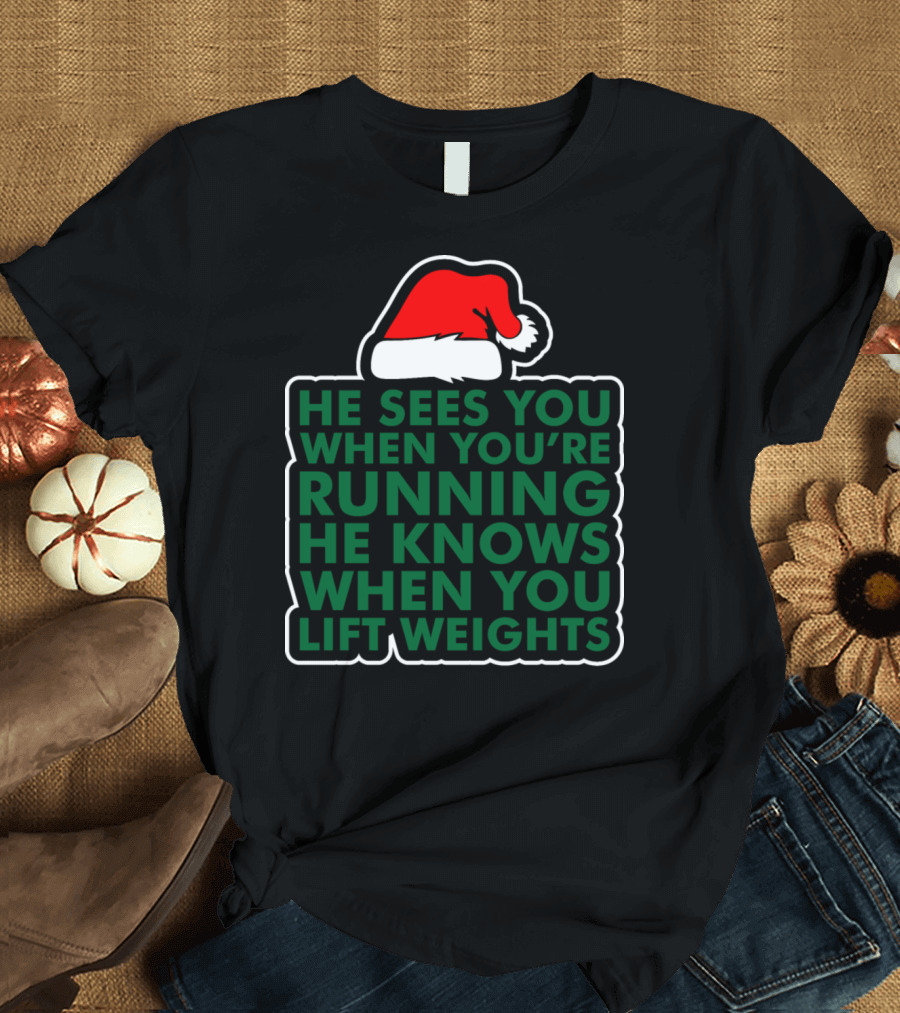 He Sees You When You're Running He Knows When You Lift Weights Santa Hat T-Shirt