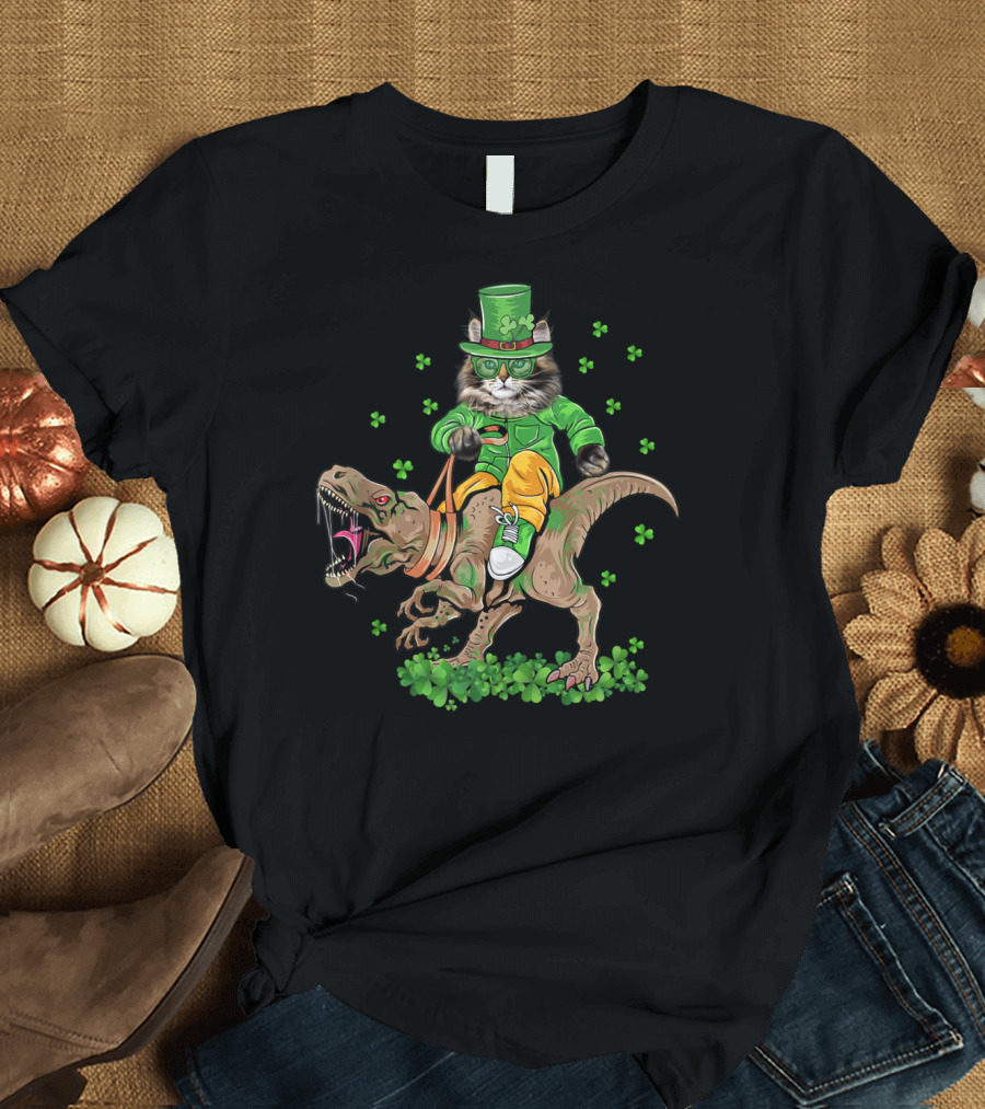 Cool Maine Coon Cat in Leprechaun Hat Riding Dinosaur Rex with Shamrocks T-Shirt