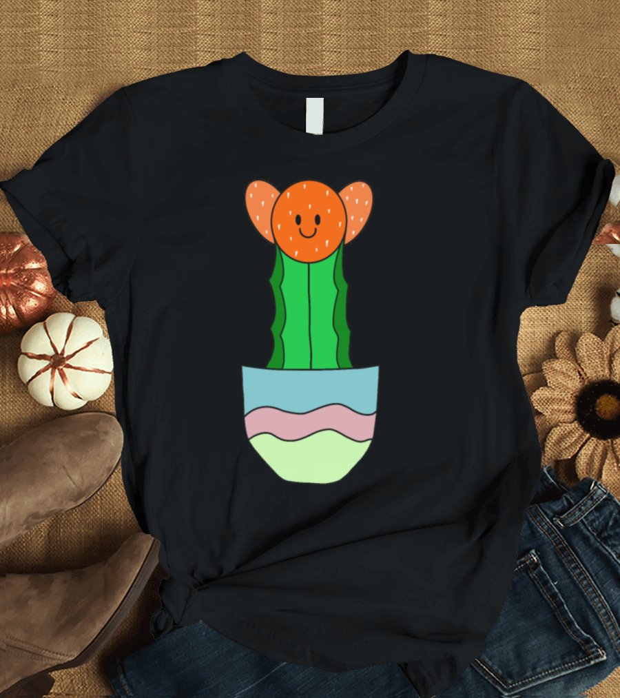 Smiling Orange-Hued Cactus with Red Blossoms in Colorful Pot T-Shirt