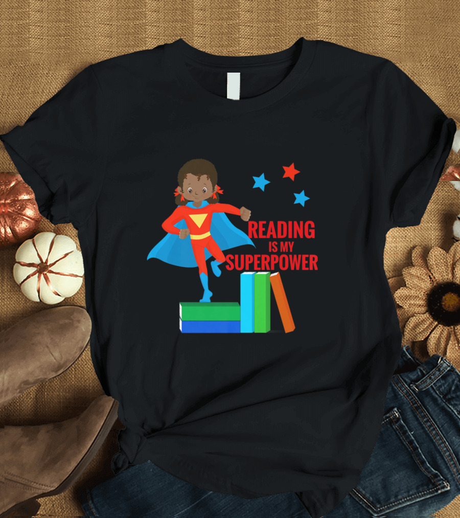 Reading Is My Superpower African American Child in Red and Blue Costume Standing on Colorful Books with Stars T-Shirt