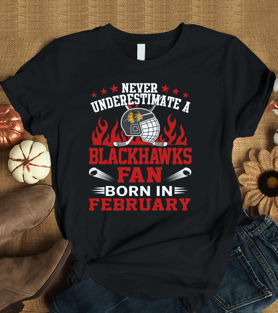 Never Underestimate A Blackhawks Fan Born In February Hockey Helmet Flame Logo Stars T-Shirt