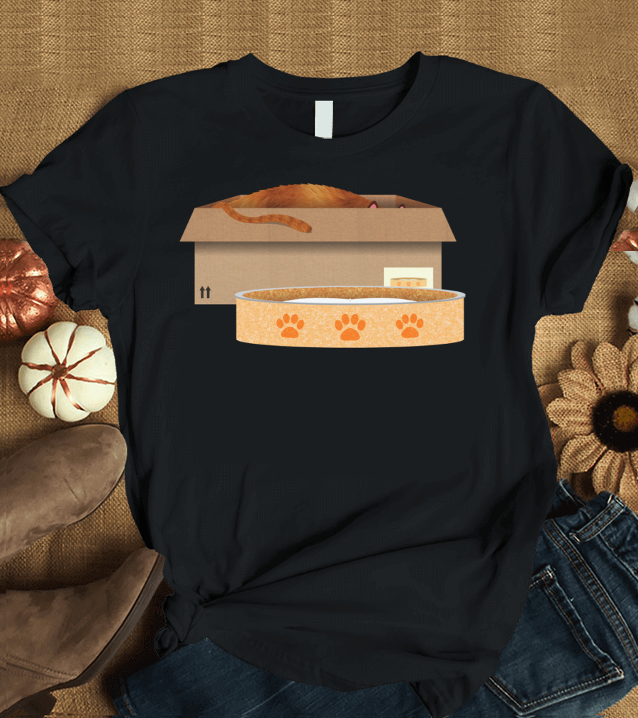 Cat in Cardboard Box Next to Paw Print Cat Bed T-Shirt