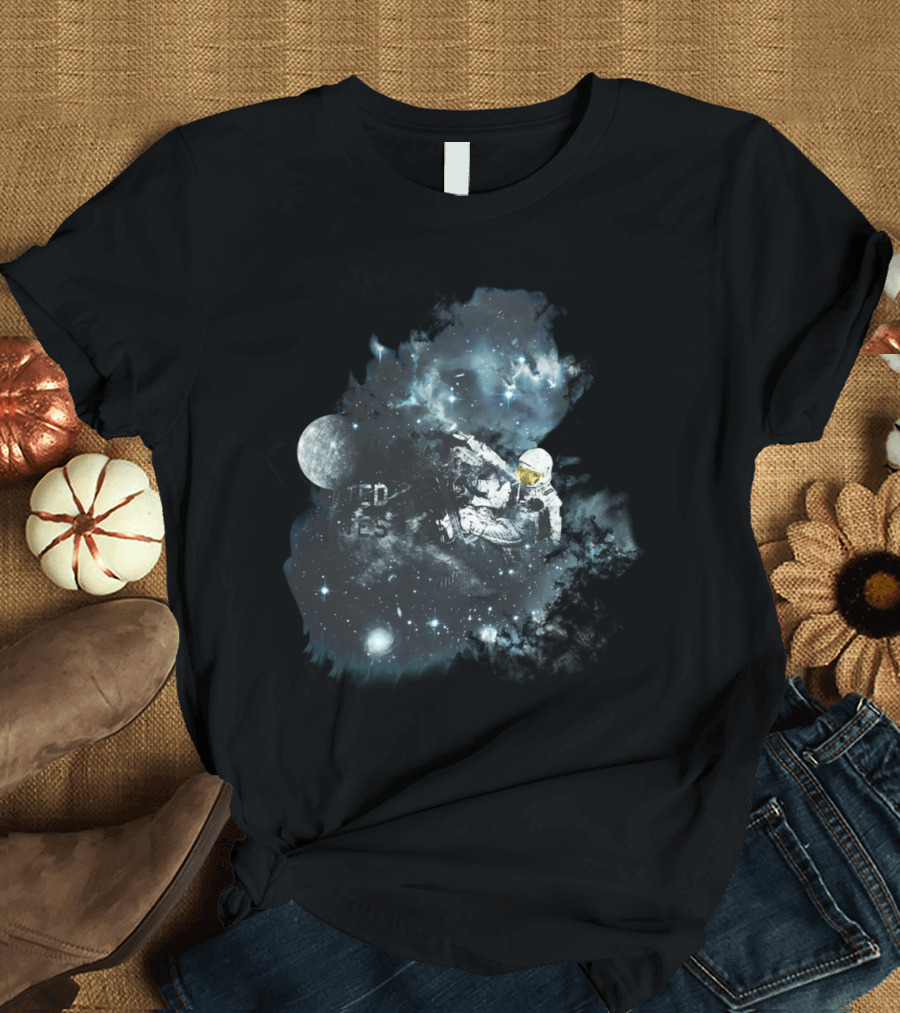 Space Astronaut Exploring Celestial Clouds and Stars T-Shirt