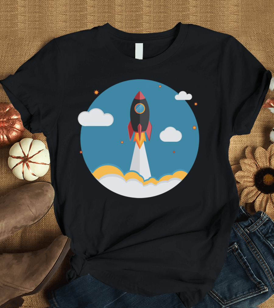 Rocket Launch Amidst Clouds and Stars in Blue Sky T-Shirt