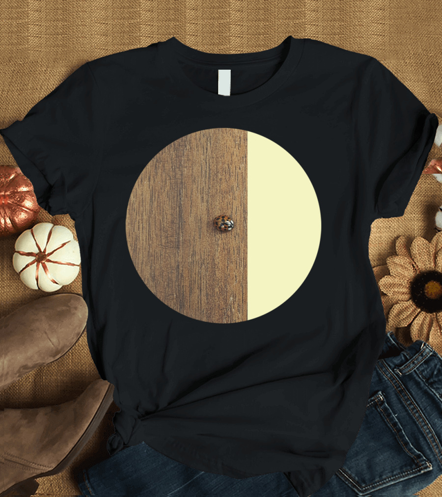 Ladybird on Wooden Surface with Yellow Contrast T-Shirt