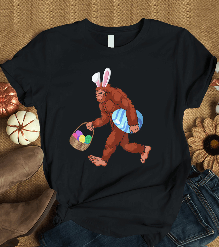 Easter Bigfoot Sasquatch with Bunny Ears Carrying Colorful Eggs Basket T-Shirt