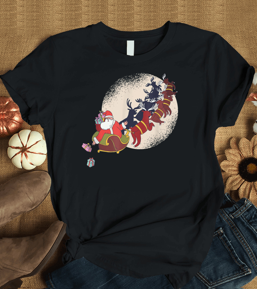 Santa Claus Flying with Reindeers Silhouette Under Full Moon Carrying Gift Sack T-Shirt