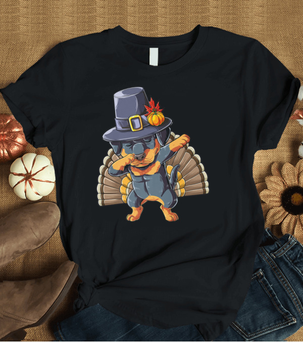 T-Shirt: Thanksgiving Dabbing Rottweiler in Pilgrim Hat with Turkey Feathers T-Shirt Thanksgiving Dabbing Rottweiler in Pilgrim Hat with Turkey Feathers T-Shirt