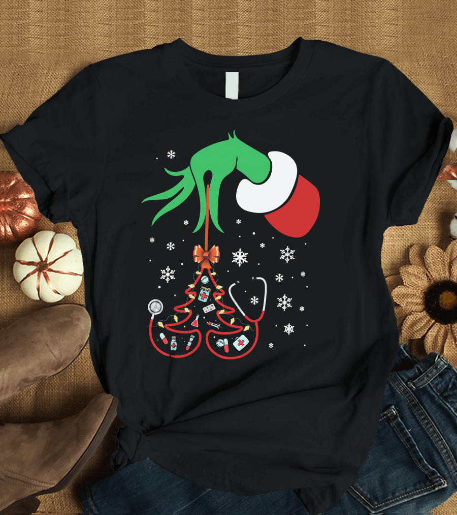 Grinch Hand Holding Nurse Themed Christmas Tree with Medical Icons T-Shirt