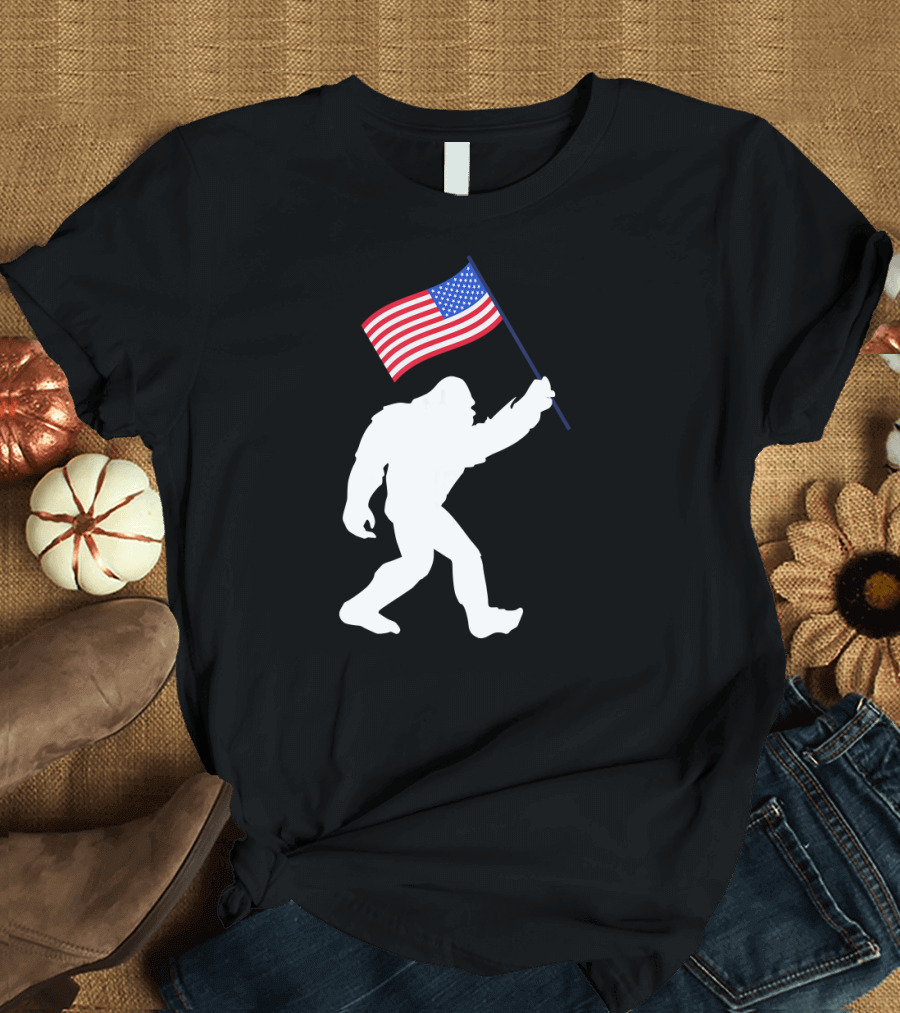 Funny Bigfoot Carrying American Flag for 4th of July Celebrations T-Shirt
