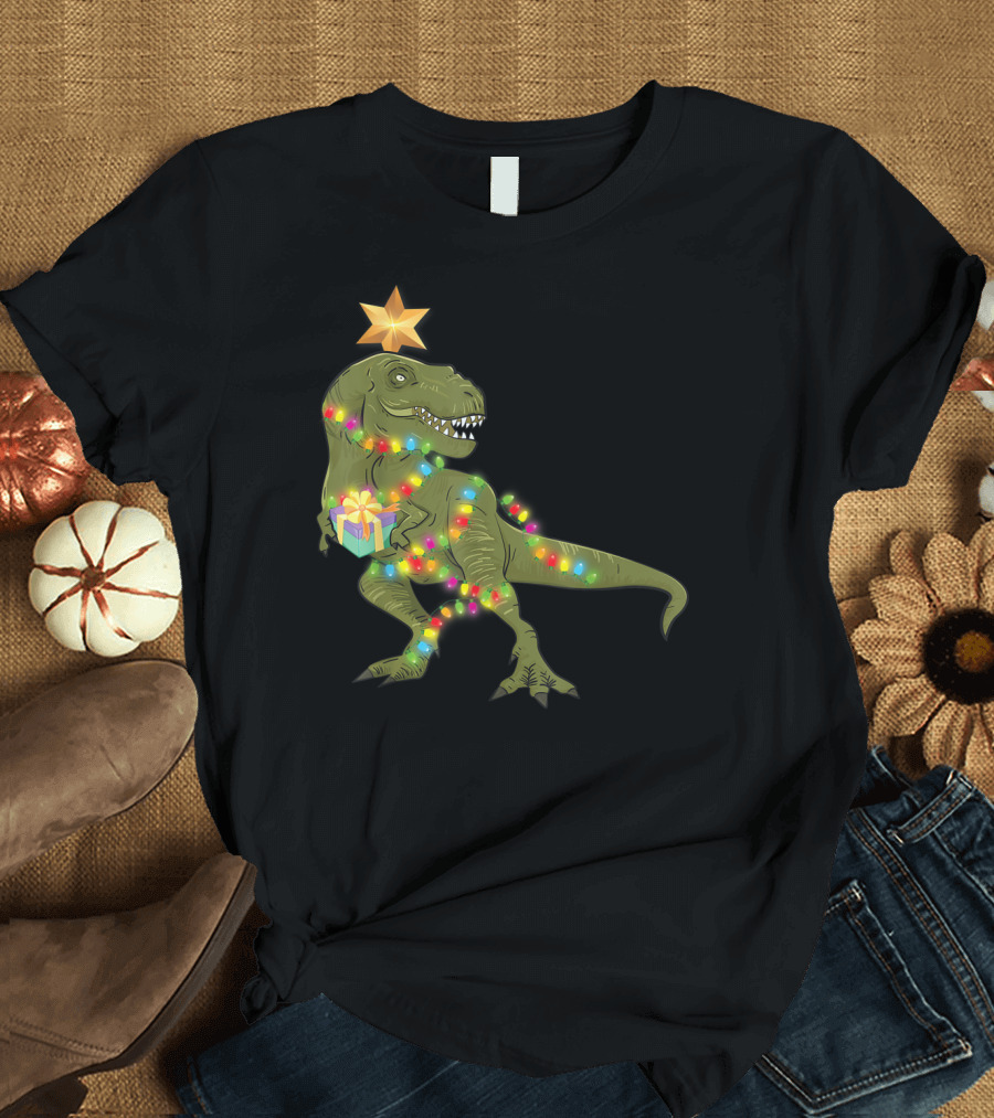 Ugly Christmas With T-Rex Wrapped in Colorful Lights Holding Gift T-Shirt