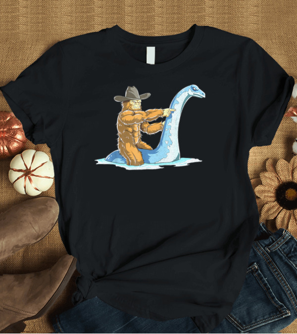 T-Shirt: Bigfoot Riding Loch Ness Monster Cowboy Style Sasquatch Nessie T-Shirt Bigfoot Riding Loch Ness Monster Cowboy Style Sasquatch Nessie T-Shirt