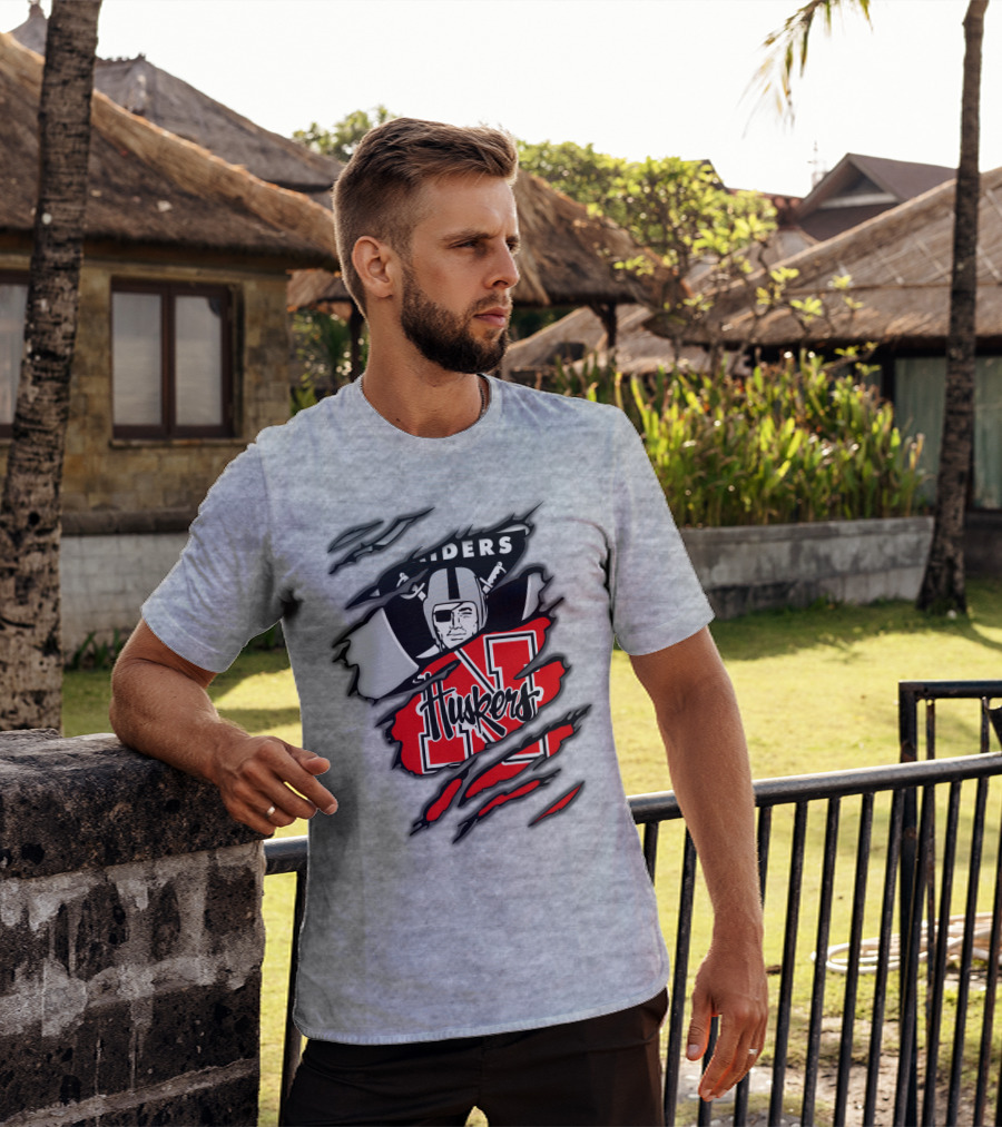 Raiders Huskers Torn Design With Icons And Symbols T-Shirt