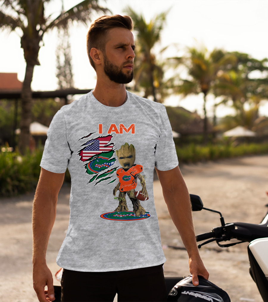 I Am Gators Baby Groot Holding Football With American Flag And Florida Gators T-Shirt