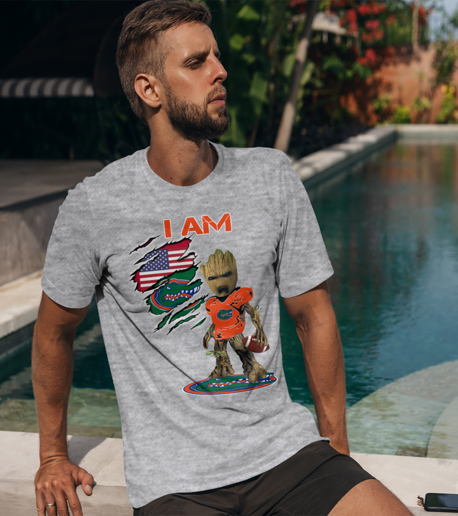 I Am Gators Baby Groot Holding Football With American Flag And Florida Gators T-Shirt