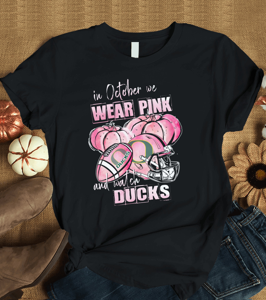 Oregon Ducks In October We Wear Pink And Watch Ducks Football Helmet Pumpkins T-Shirt
