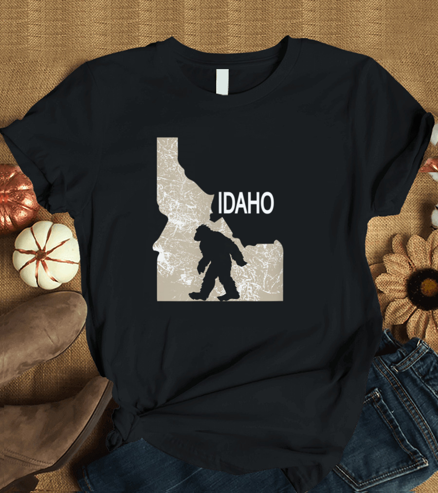 Funny Bigfoot Silhouette Walking in Idaho State Map I Believe Idaho Loves Bigfoot T-Shirt