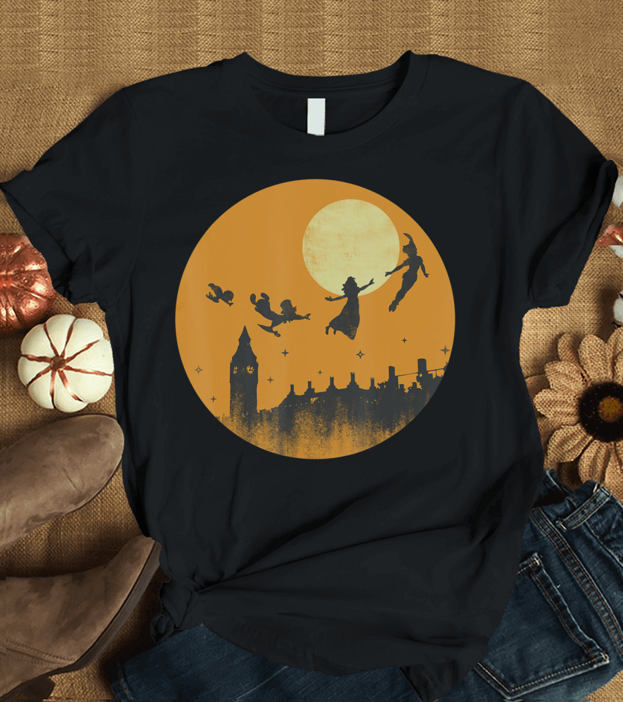 Disney Peter Pan and Darling Children Flying Silhouettes Against Orange Full Moon Over London Skyline T-Shirt