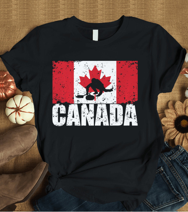 T-Shirt: Canadian Flag Curling Silhouette Against Distressed Flag Design with Bold Canada Lettering T-Shirt Canadian Flag Curling Silhouette Against Distressed Flag Design with Bold Canada Lettering T-Shirt