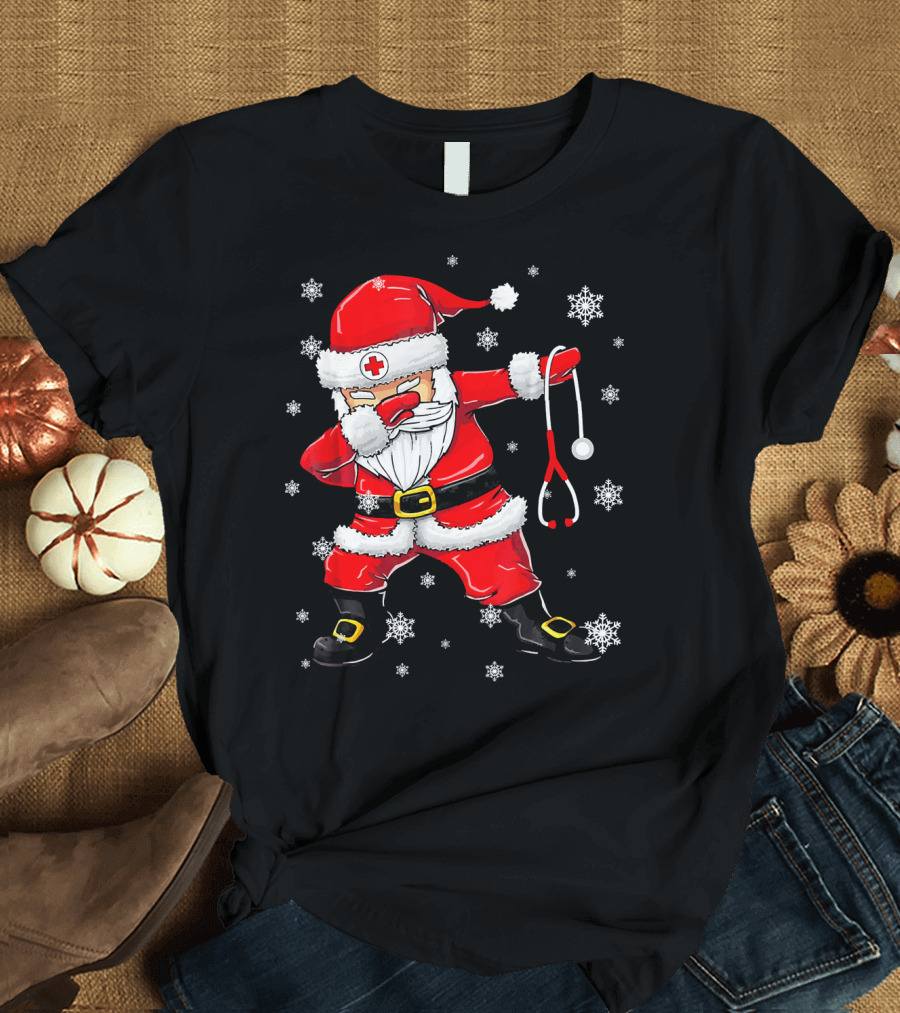 Dabbing Santa with Stethoscope Surrounded by Snowflakes T-Shirt