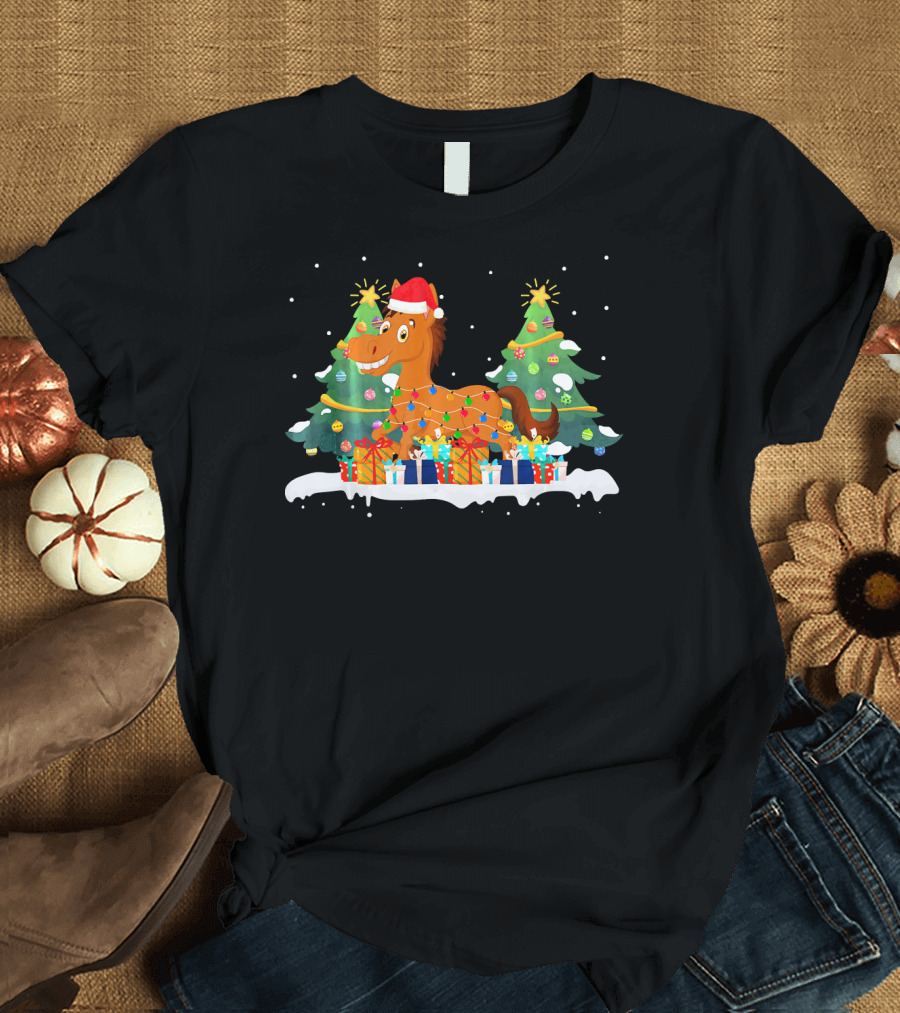 Horse Wrapped in Christmas Lights with Santa Hat Among Festive Trees and Gifts T-Shirt