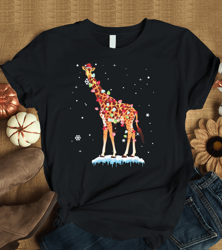 Colorful Festive Giraffe Wrapped in Christmas Lights in Snowfall Scene T-Shirt