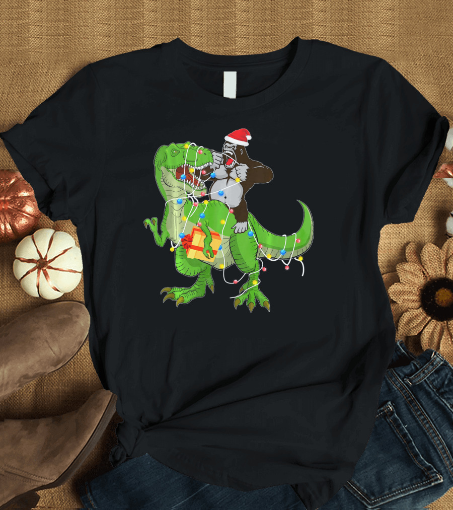 Gorilla Riding Dinosaur Rex Christmas Lights Santa Hat Present T-Shirt