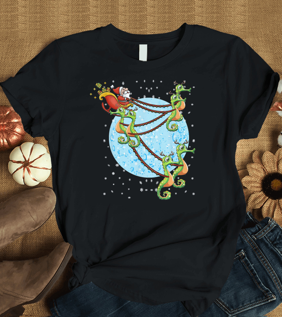 Santa Sleigh Pulled by Seahorse Reindeer with Snowflakes and Moon Background T-Shirt