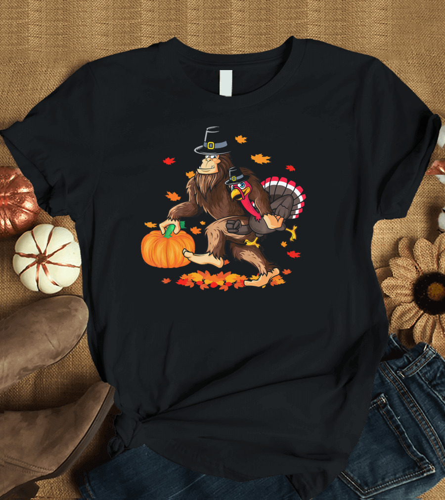 Funny Bigfoot Thanksgiving Pilgrim Turkey Holding Pumpkin with Autumn Leaves T-Shirt