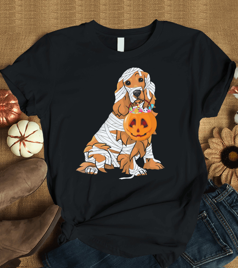 Cocker Spaniel Wrapped in Mummy Costume with Pumpkin Trick-or-Treat Bucket T-Shirt