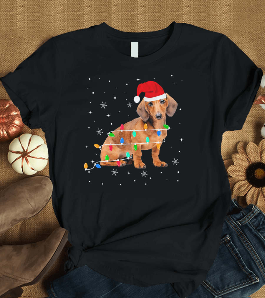 Dachshund Wrapped in Christmas Lights with Santa Hat and Snowflakes T-Shirt
