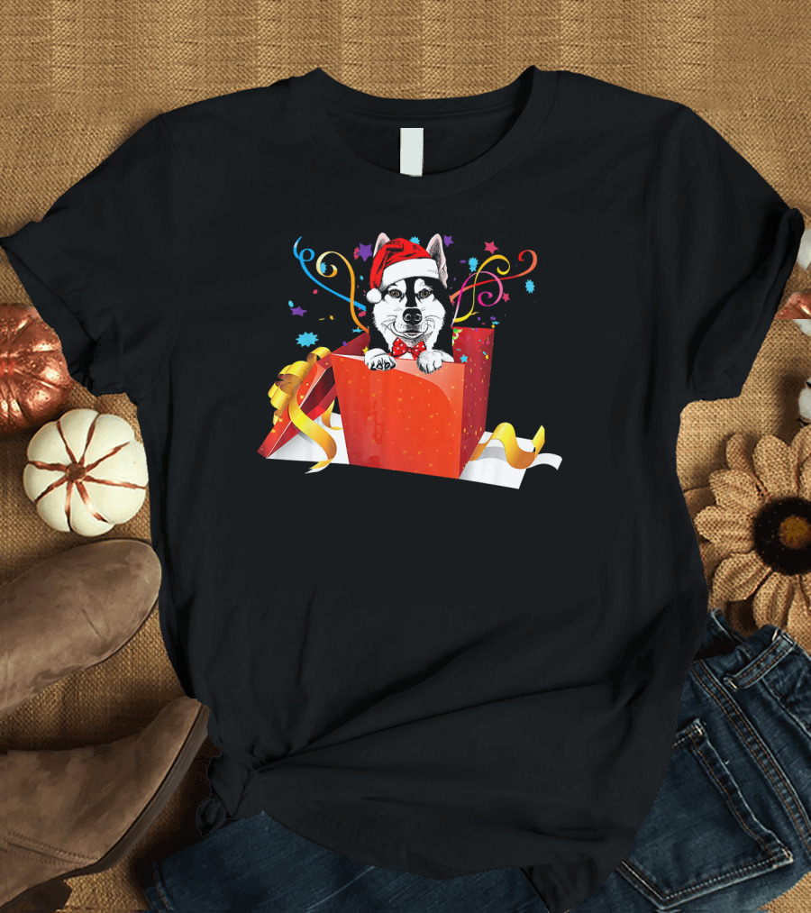 Siberian Husky Wearing Santa Hat in Festive Christmas Gift Box with Ribbons and Confetti T-Shirt