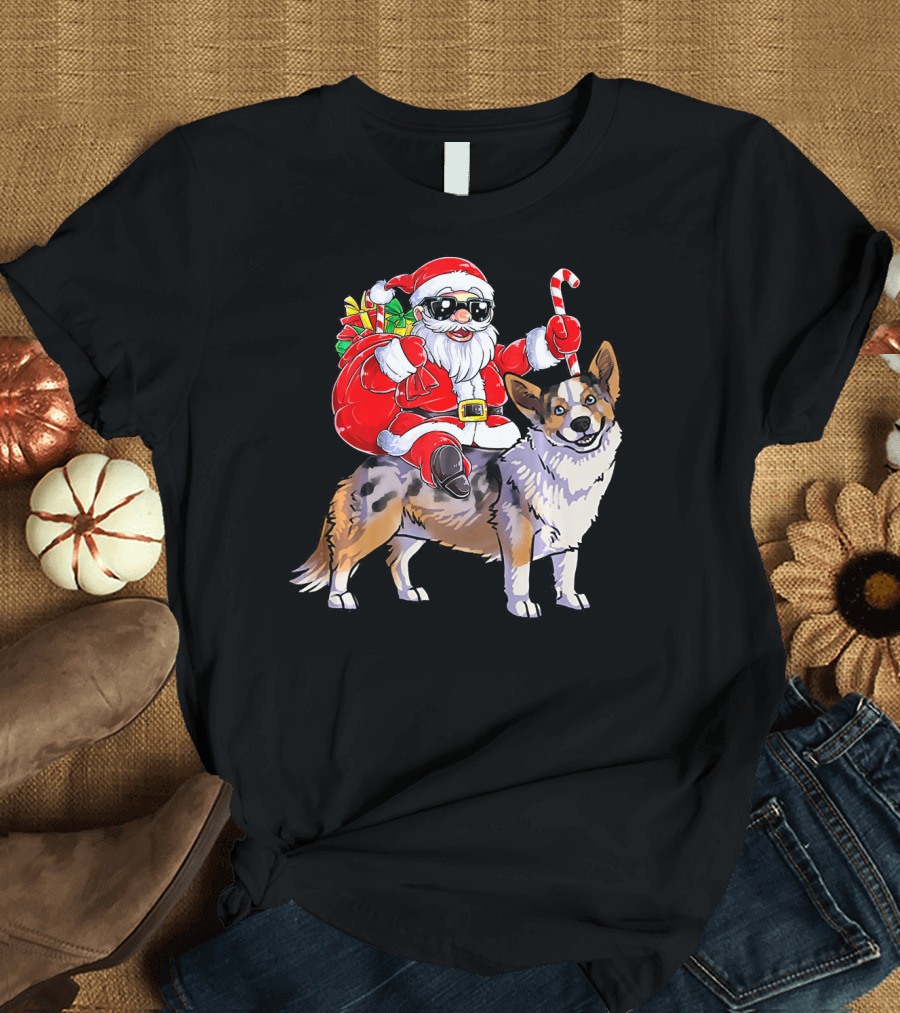 Santa Claus with Goggles Riding Cardigan Welsh Corgi Holding Candy Cane T-Shirt
