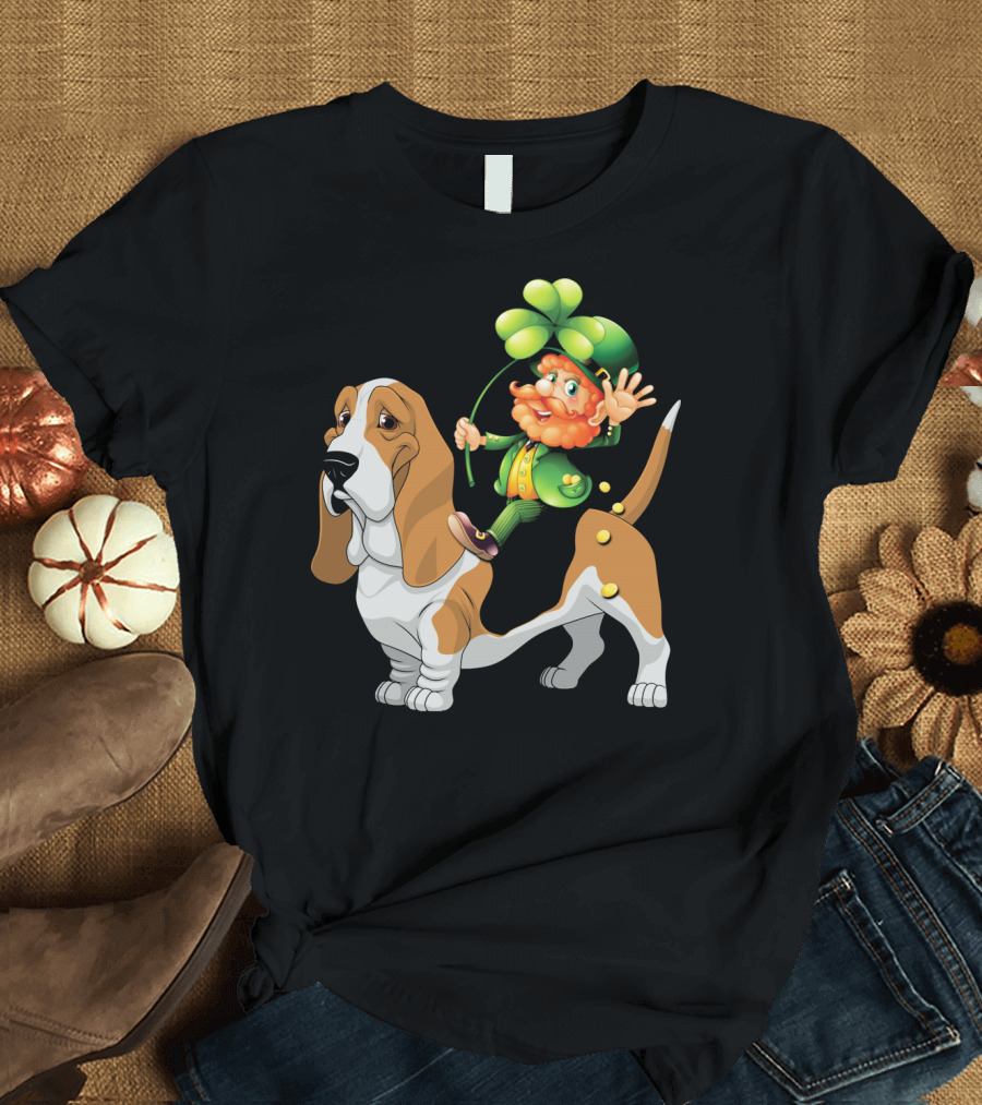 Leprechaun Riding Basset Hound Dog in Irish Green Attire Holding Shamrock T-Shirt