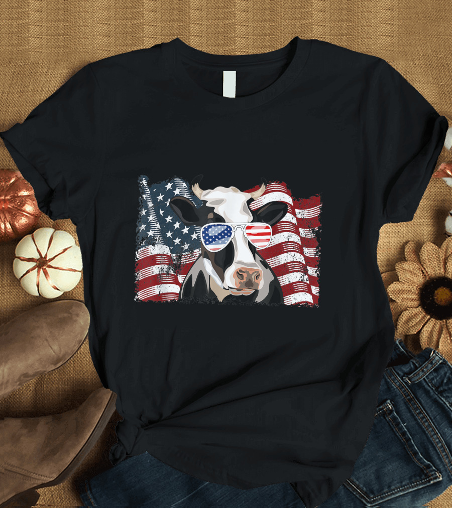 Dairy Cow Wearing American Flag Sunglasses with Waving US Flag Background for 4th of July T-Shirt