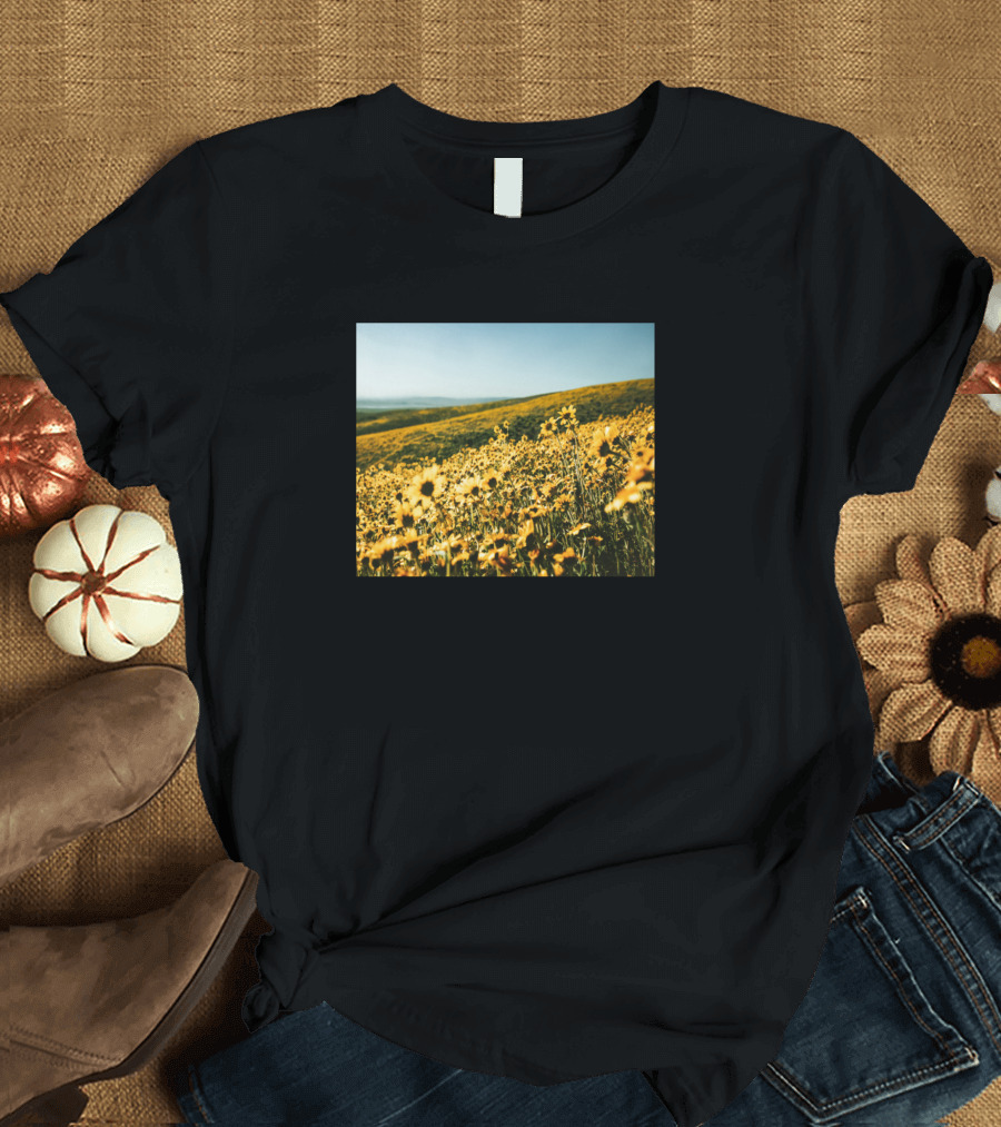 Beautiful View of Daisy Field Pasture Near Grassy Hills in Blooming Meadow T-Shirt