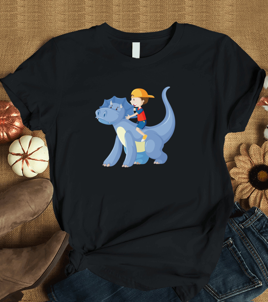 Boy Riding on Blue Dinosaur Cartoon Character in Yellow Cap and Red T-Shirt