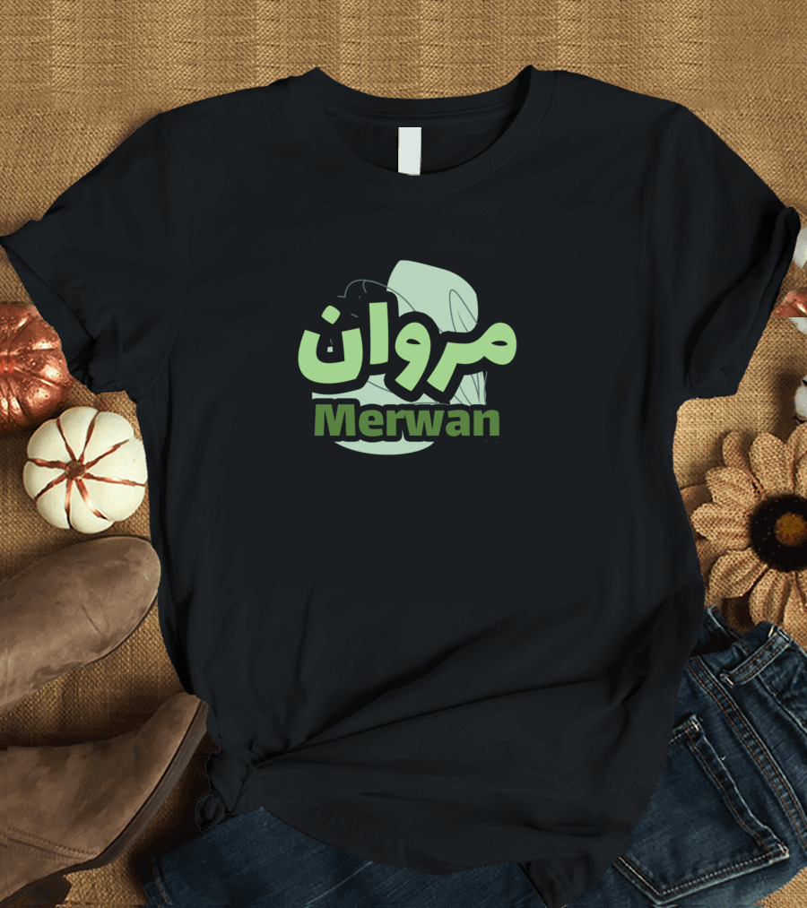 Merwan Name in Arabic Script with Green Leaf Background T-Shirt