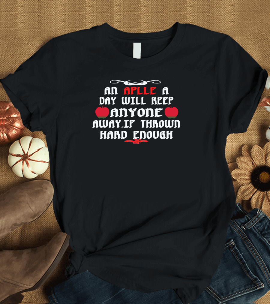An Aplle a Day Will Keep Anyone Away If Thrown Hard Enough Bold Red Apple Typography T-Shirt