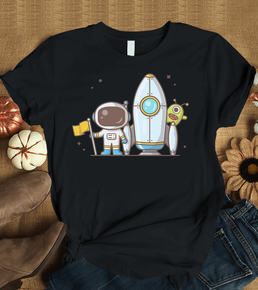 Cute Astronaut Holding Flag with Rocket and Alien Companion T-Shirt