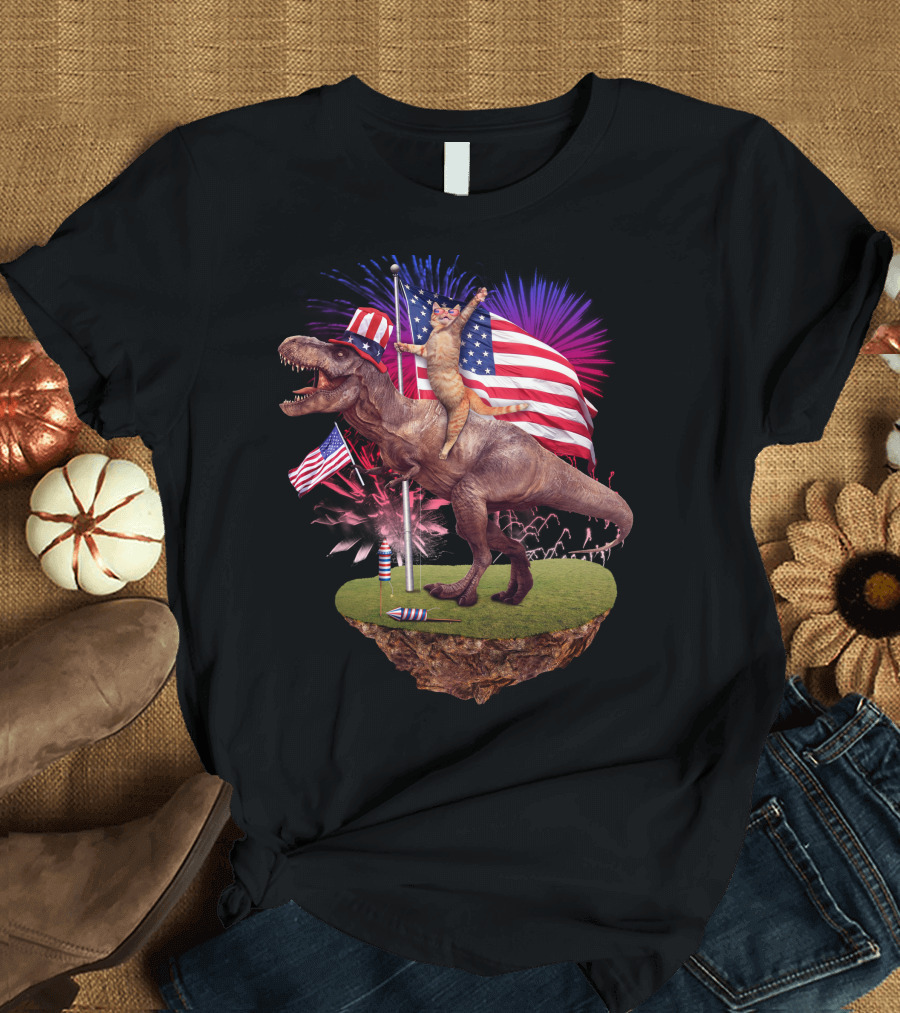 Cat Riding Dinosaur with American Flags and Fireworks for 4th of July T-Shirt