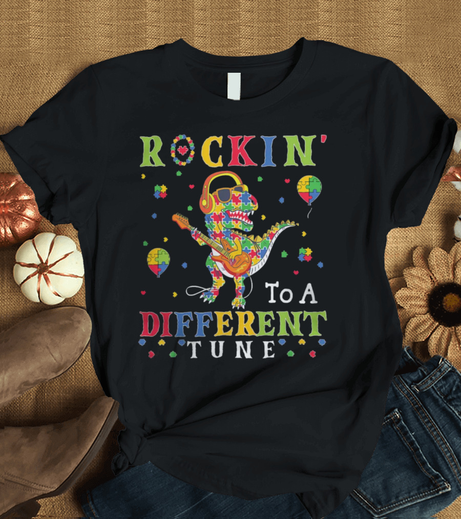 Rockin' To A Different Tune TRex Dinosaur Autism Awareness Puzzle Pieces T-Shirt