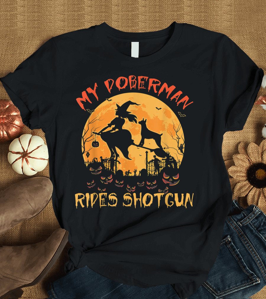 My Doberman Rides Shotgun Halloween Witch and Pumpkins Moon Scene T-Shirt