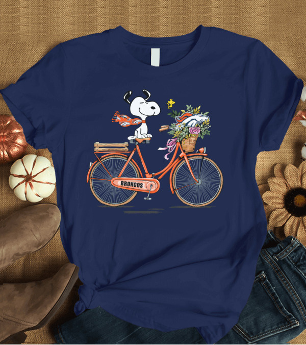 T-Shirt: Denver Broncos Snoopy on Bicycle with Woodstock and Helmet T-Shirt Denver Broncos Snoopy on Bicycle with Woodstock and Helmet T-Shirt
