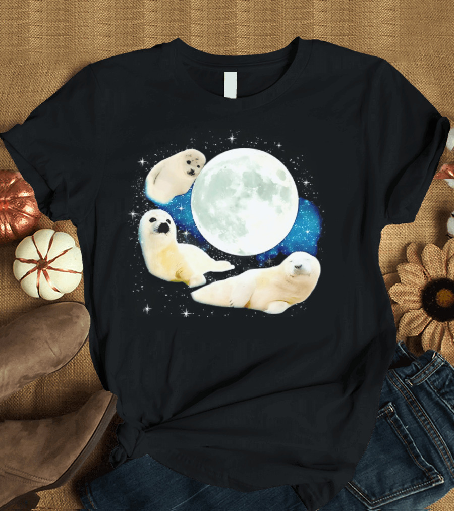 Adorable Seals Playfully Resting Under A Radiant Full Moonlit Sky With Cosmic Backdrop T-Shirt