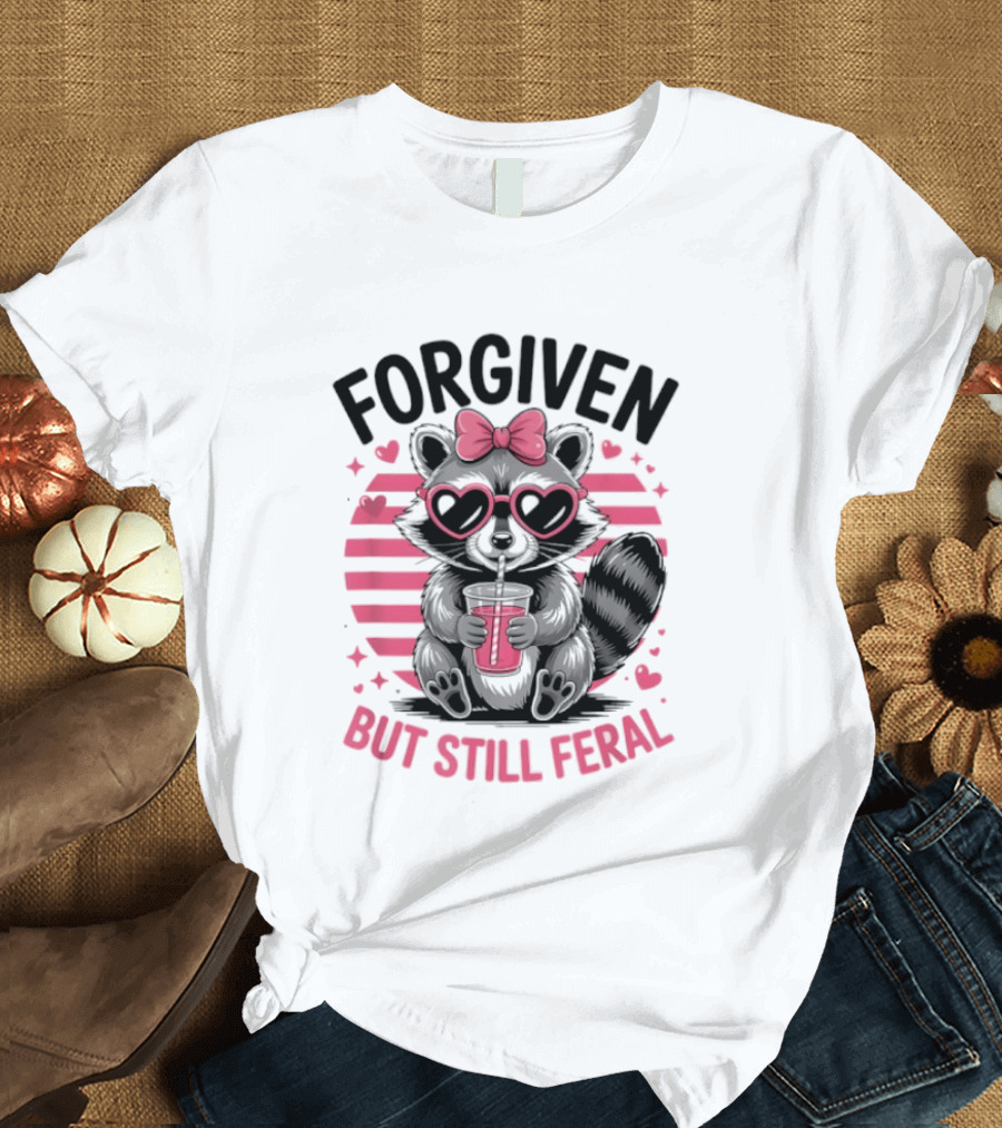 Forgiven But Still Feral Raccoon With Heart Glasses And Bow T-Shirt