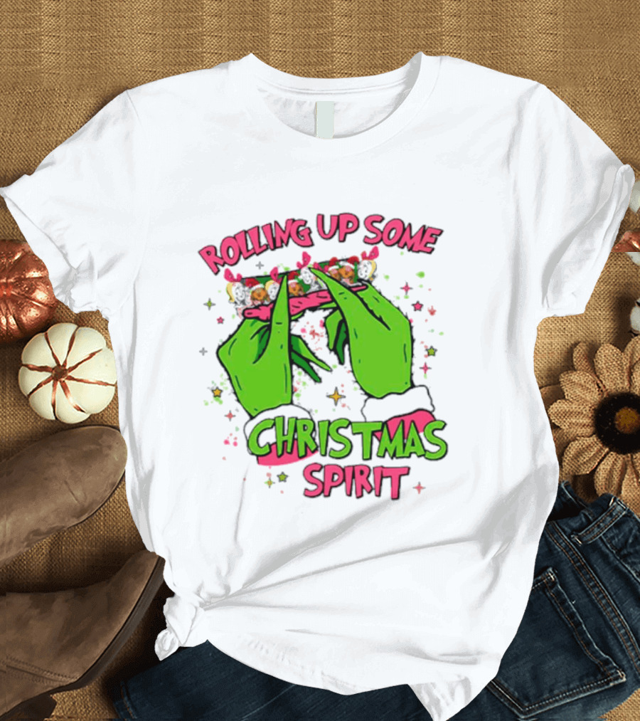 Grinch Rolling Up Some Christmas Spirit With Green Hands And Glitter Stars T-Shirt