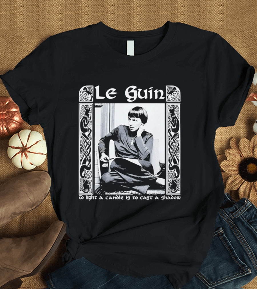 Le Guin To Light A Candle Is To Cast A Shadow T-Shirt