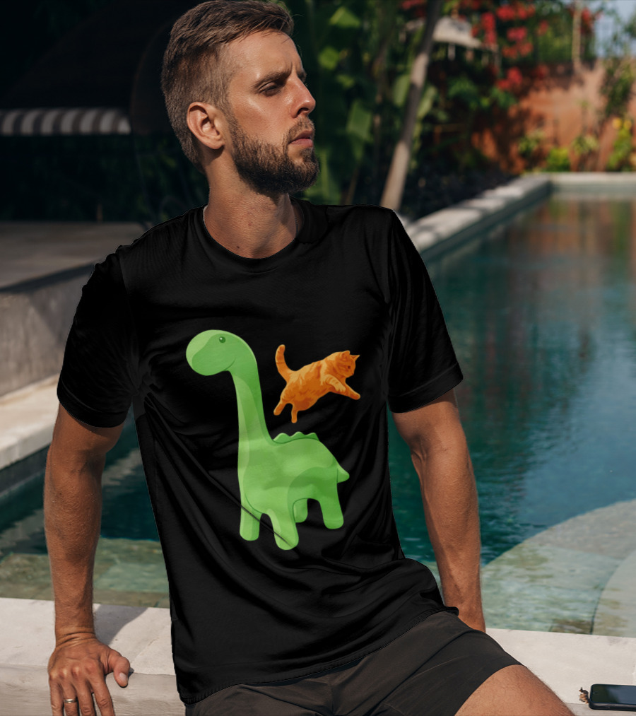 Cat Jumping Over Green Dinosaur Cartoon Image T-Shirt